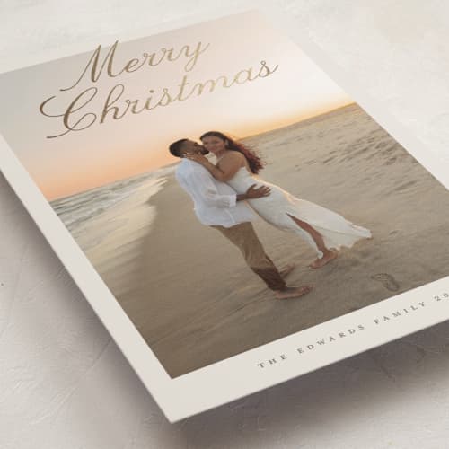 This is a sand foil pressed holiday cards with foil pressed by Nicole Walsh called modern script printing on recycled smooth signature in standard