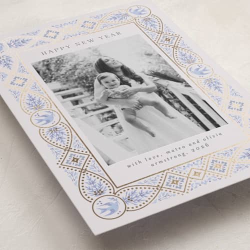 This is a blue spruce foil pressed holiday cards with foil pressed by Ana de Sousa called symbols of faith printing on recycled smooth signature in standard