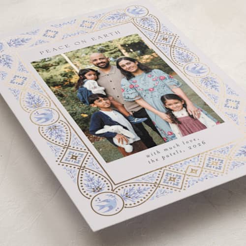 This is a blue spruce foil pressed holiday cards with foil pressed by Ana de Sousa called symbols of faith printing on recycled smooth signature in standard