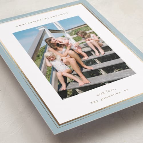 This is a sky foil pressed holiday cards with foil pressed by Christy Hy Lee called clean frame printing on recycled smooth signature in standard