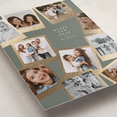 This is a sage foil pressed holiday cards with foil pressed by Lori Wemple called snapshots printing on recycled smooth signature in standard