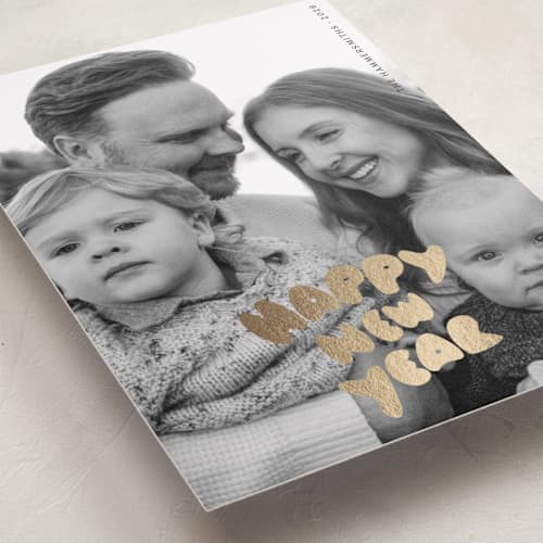 This is a coal foil pressed holiday cards with foil pressed by Studio Suku called bubble type printing on recycled smooth signature in standard