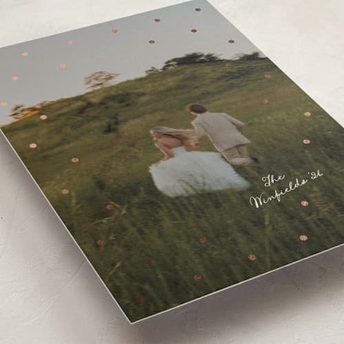This is a vanilla foil pressed holiday cards with foil pressed by Morgan Kendall called speckled printing on recycled smooth signature in standard