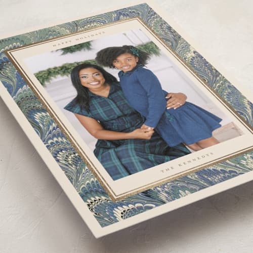 This is a blue spruce foil pressed holiday cards with foil pressed by Jenna Holcomb called marbled printing on recycled smooth signature in standard