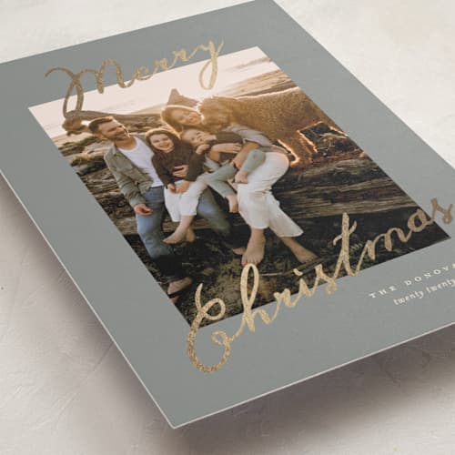 This is a sage foil pressed holiday cards with foil pressed by Pixel and Hank called merriment printing on recycled smooth signature in standard