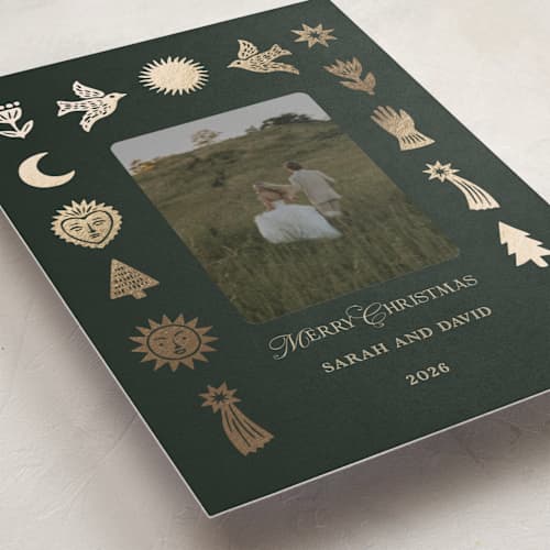 This is a evergreen foil pressed holiday cards with foil pressed by Rina Ozum called folk icons printing on recycled smooth signature in standard
