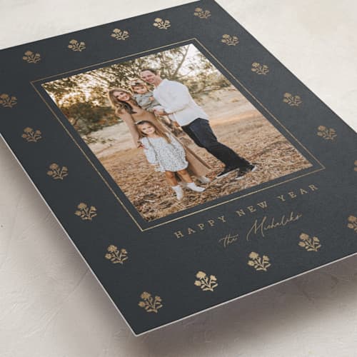 This is a coal foil pressed holiday cards with foil pressed by Angela Garrick called gilded flowers printing on recycled smooth signature in standard