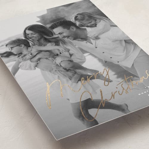 This is a snowflake foil pressed holiday cards with foil pressed by Wildfield Paper Co called signature printing on recycled smooth signature in standard