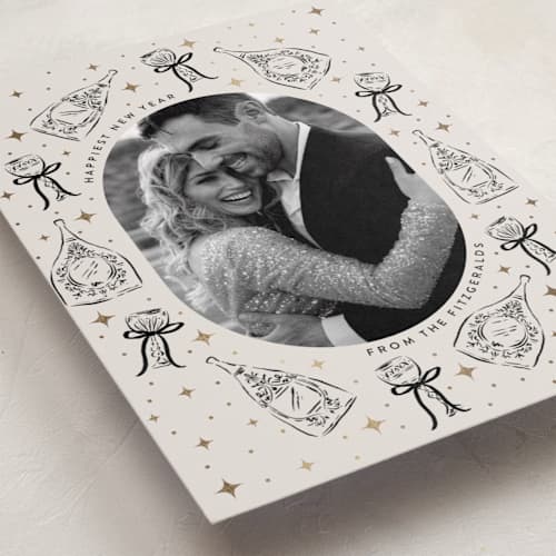 This is a noir foil pressed holiday cards with foil pressed by Jackie Crawford called champagne new year printing on recycled smooth signature in standard