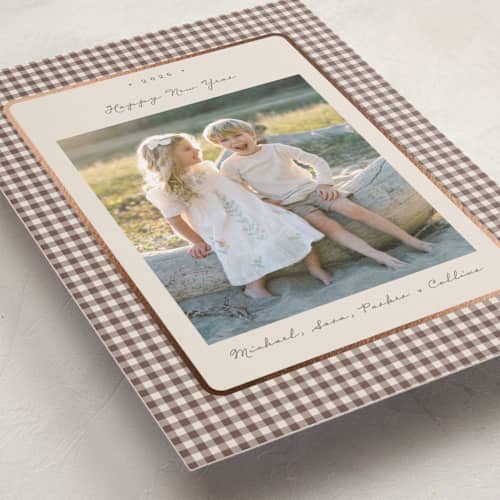 This is a gingerbread latte foil pressed holiday cards with foil pressed by Emily Betts called gingham vintage printing on recycled smooth signature in standard