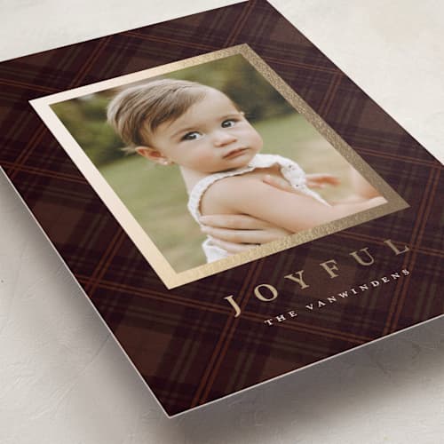 This is a cranberry foil pressed holiday cards with foil pressed by Olivia Kanaley Inman called balmoral green printing on recycled smooth signature in standard