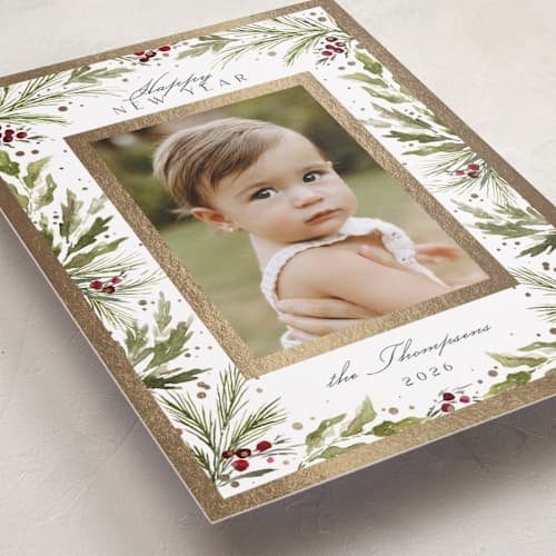 This is a snow foil pressed holiday cards with foil pressed by Kate Ahn called boxwood and berries printing on recycled smooth signature in standard