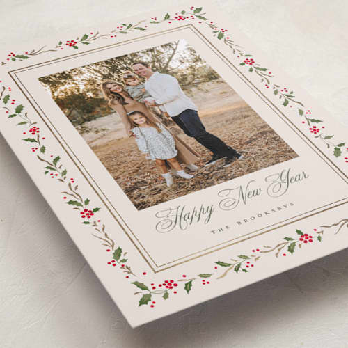 This is a cream foil pressed holiday cards with foil pressed by Erin L. Wilson called hawthorne printing on recycled smooth signature in standard