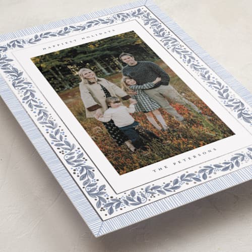 This is a frost foil pressed holiday cards with foil pressed by Jenna Holcomb called antique greenery printing on recycled smooth signature in standard