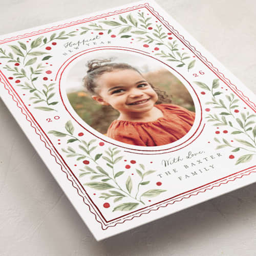 This is a holly berry foil pressed holiday cards with foil pressed by Everett Paper Goods called mirror foliage printing on recycled smooth signature in standard