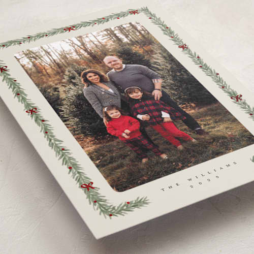 This is a eggnog foil pressed holiday cards with foil pressed by Adelyn T. called pine and bow printing on recycled smooth signature in standard