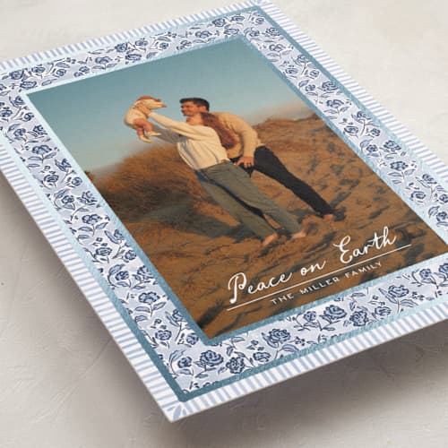 This is a frost foil pressed holiday cards with foil pressed by Jenna Holcomb called a cottage christmas printing on recycled smooth signature in standard