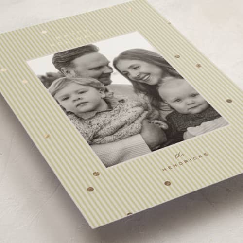 This is a olive foil pressed holiday cards with foil pressed by Ellen Schlegelmilch called tiny polka dots printing on recycled smooth signature in standard