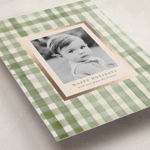 This is a sage foil pressed holiday cards with foil pressed by Meagan Christensen called gingham printing on recycled smooth signature in standard