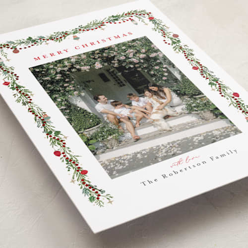 This is a holly berry foil pressed holiday cards with foil pressed by Susan Moyal called pine garland printing on recycled smooth signature in standard