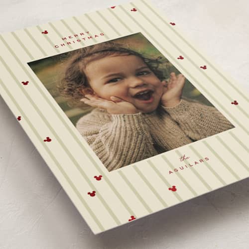 This is a mint foil pressed holiday cards with foil pressed by Ellen Schlegelmilch called disney's mickey festive stripes printing on recycled smooth signature in standard