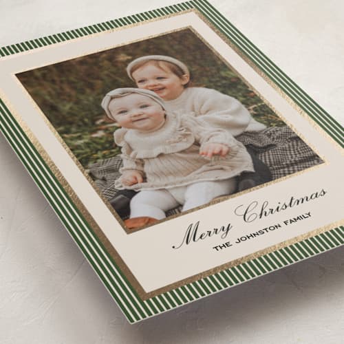 This is a pine foil pressed holiday cards with foil pressed by Annie Shapiro called barre printing on recycled smooth signature in standard