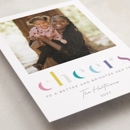 This is a funfetti gloss press holiday cards with gloss press by Lisa McLean called deconstructed cheers printing on recycled smooth signature in standard