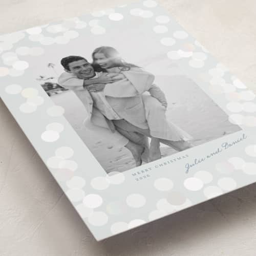 This is a frost gloss press holiday cards with gloss press by Claudia Orengo called lights printing on recycled smooth signature in standard