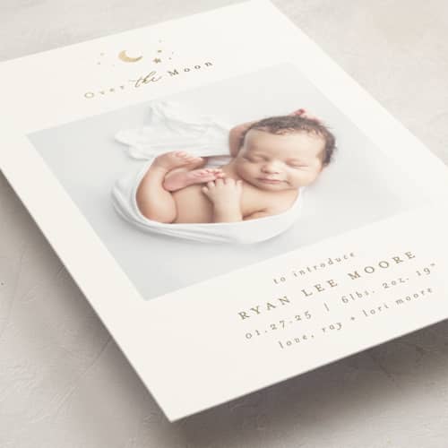 This is a fawn foil stamped birth announcements with foil pressed by AK Graphics called over the moon printing on signature in standard