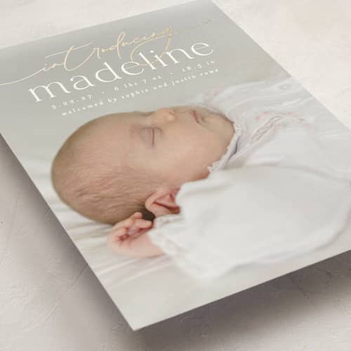 This is a parchment foil stamped birth announcements with foil pressed by Everett Paper Goods called mist printing on signature in standard