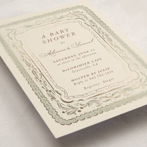 This is a buttercream foil stamped baby shower invitations with foil pressed by Lucrecia Caporale called scallop border printing on signature in standard