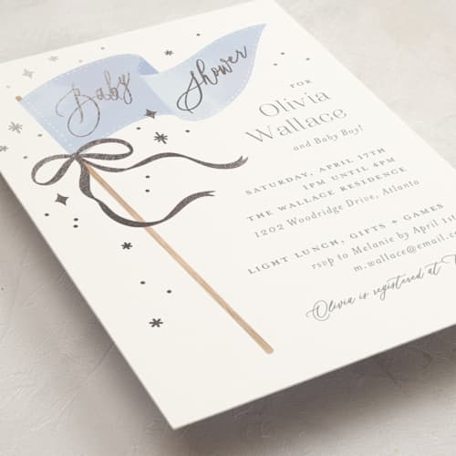 This is a baby blue foil stamped baby shower invitations with foil pressed by Paper Raven Co. called bows & banners printing on signature in standard