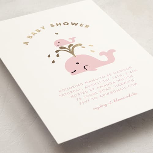 This is a baby pink foil stamped baby shower invitations with foil pressed by mo kelley called baby whale on the way printing on signature in standard