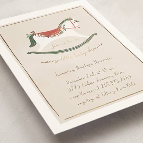 This is a eggnog foil stamped baby shower invitations with foil pressed by Rebecca Durflinger called festive rocking horse printing on signature in standard