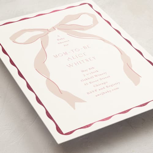 This is a blush foil stamped baby shower invitations with foil pressed by Baumbirdy called framed bow printing on signature in standard