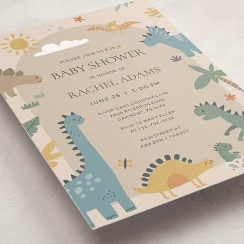 This is a tan baby shower invitations with standard by Britt called baby dino printing on signature in standard