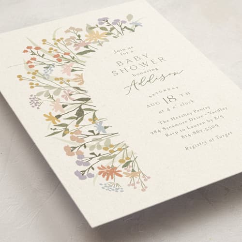 This is a vanilla baby shower invitations with standard by Jennifer Wick called meadow flowers printing on signature in standard