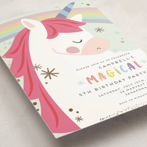This is a bubblegum kids birthday invitations with foil pressed by peetie design called unicorno printing on signature in standard