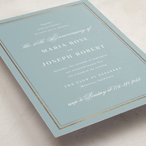 This is a powder blue holiday party invitations with foil pressed by Jennifer Postorino called polished printing on signature in standard