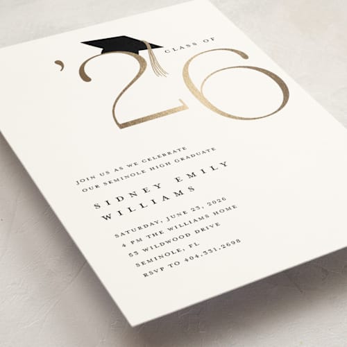 This is a cotton graduation invitations with foil pressed by Stacey Meacham called cap and year printing on signature in standard