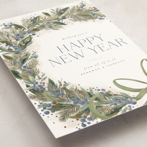 This is a juniper business holiday cards with foil pressed by Jackie Crawford called festive side ribbon wreath printing on signature in standard