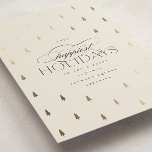 This is a ivory business holiday cards with foil pressed by Carolyn Nicks called joyful trees printing on signature in standard