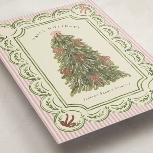 This is a peony business holiday cards with foil pressed by Chris Griffith called holiday bow tree printing on signature in standard