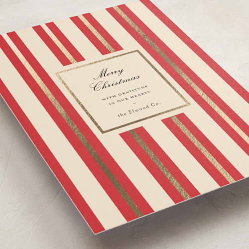 This is a poinsettia business holiday cards with foil pressed by Sara Hicks Malone called golden stripe printing on signature in standard