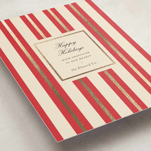 This is a poinsettia business holiday cards with foil pressed by Sara Hicks Malone called golden stripe printing on signature in standard