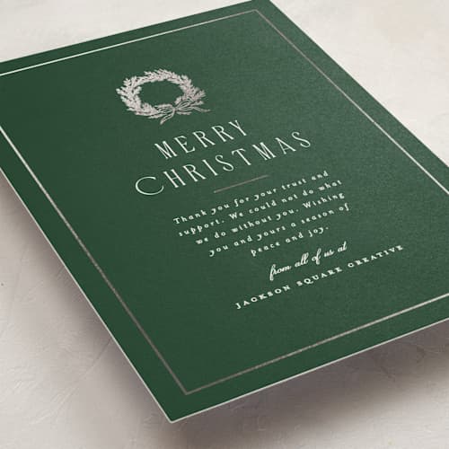 This is a pine business holiday cards with foil pressed by Amy Kross called magnolia printing on signature in standard