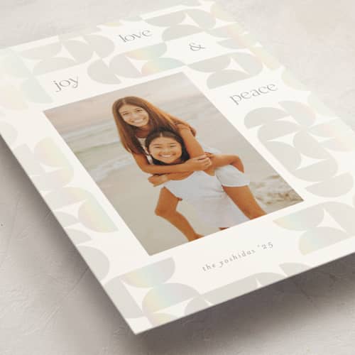 This is a frost gloss press holiday cards with gloss press by Lisa McLean called semi circle pieces printing on signature in standard