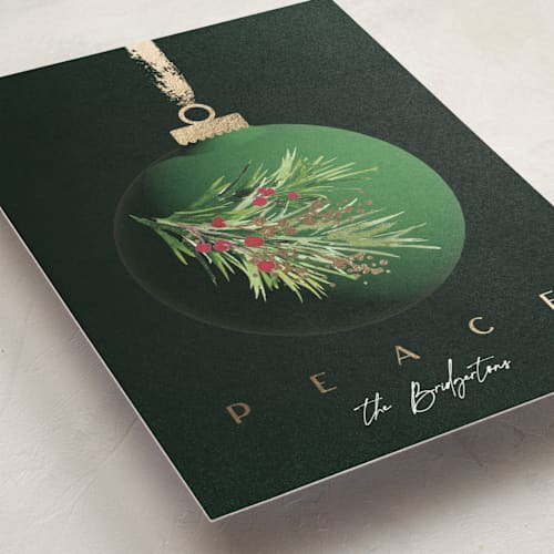 This is a emerald foil pressed holiday cards with foil pressed by silverscreen studio called vintage bauble printing on signature in standard