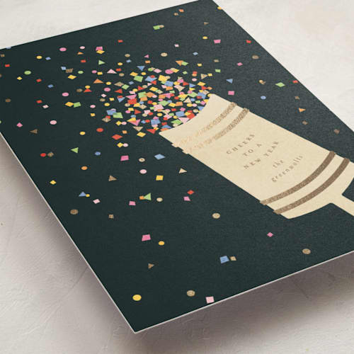 This is a midnight foil pressed holiday cards with foil pressed by Ellen Schlegelmilch called confetti popper printing on signature in standard