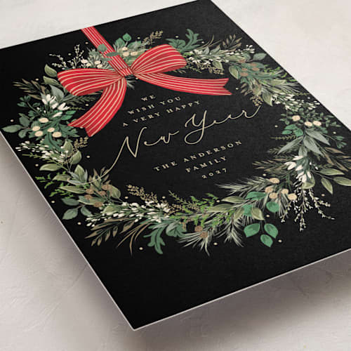 This is a holly berry foil pressed holiday cards with foil pressed by Susan Moyal called festive holiday printing on signature in standard